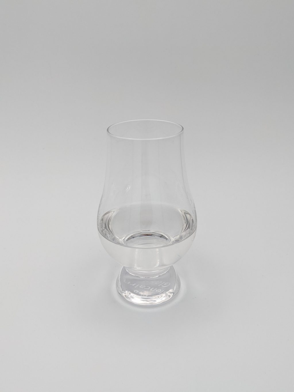 clear liquid in a glencairn glass