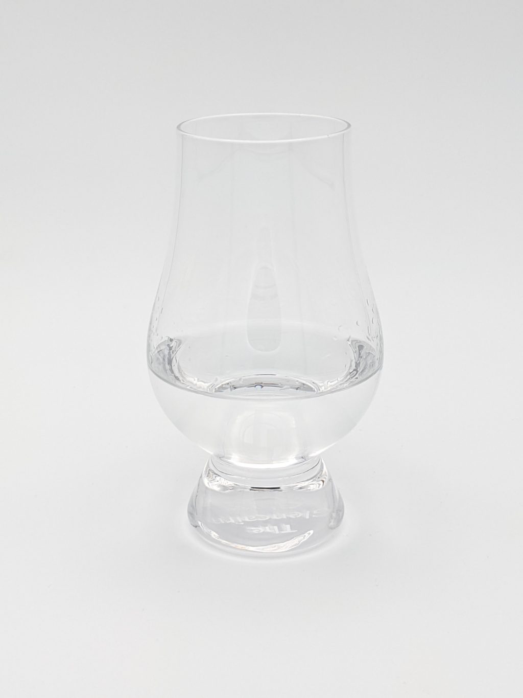 Clear Liquid in a glencairn Glass