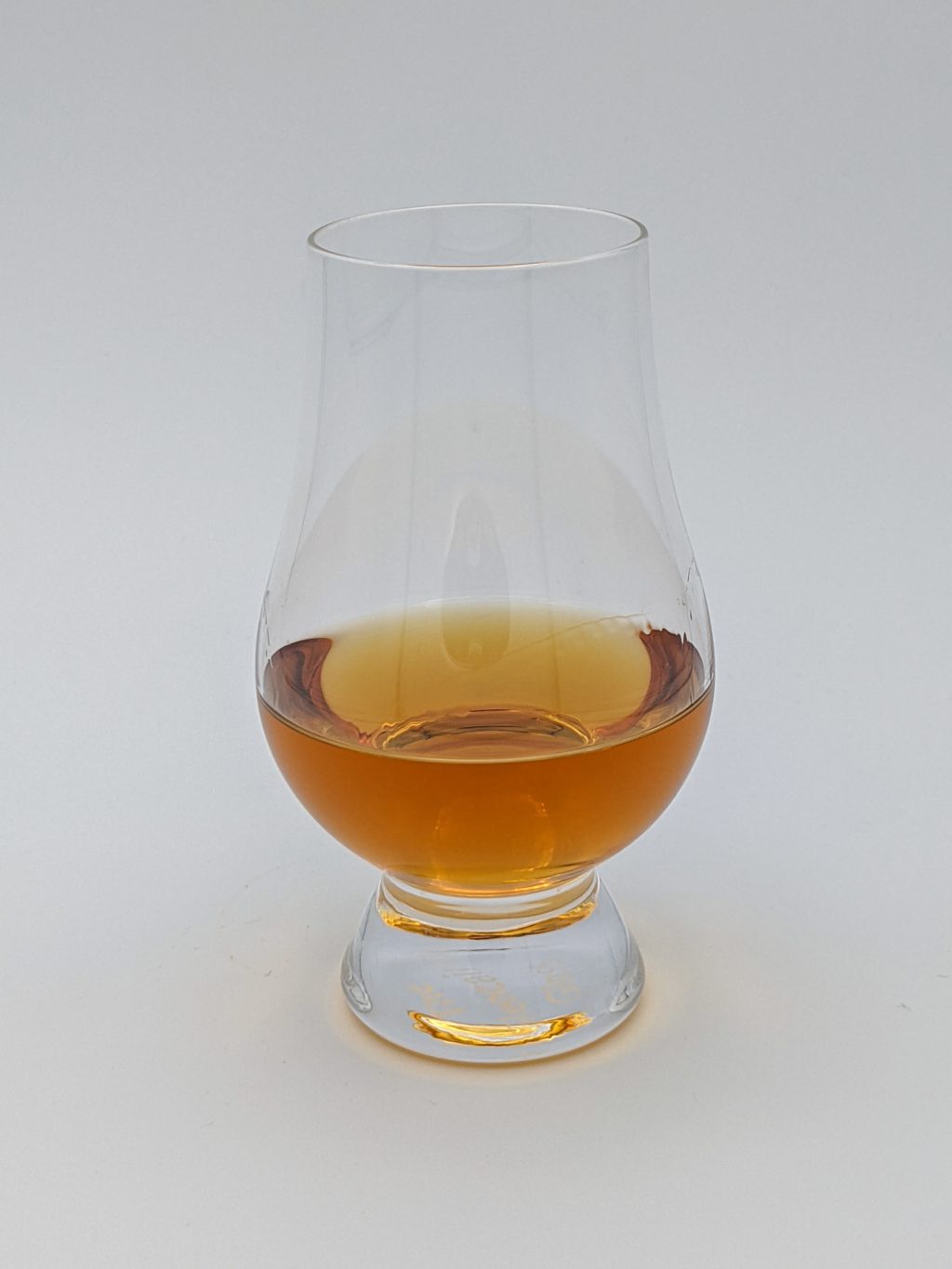 light brown liquid in a glencairn glass
