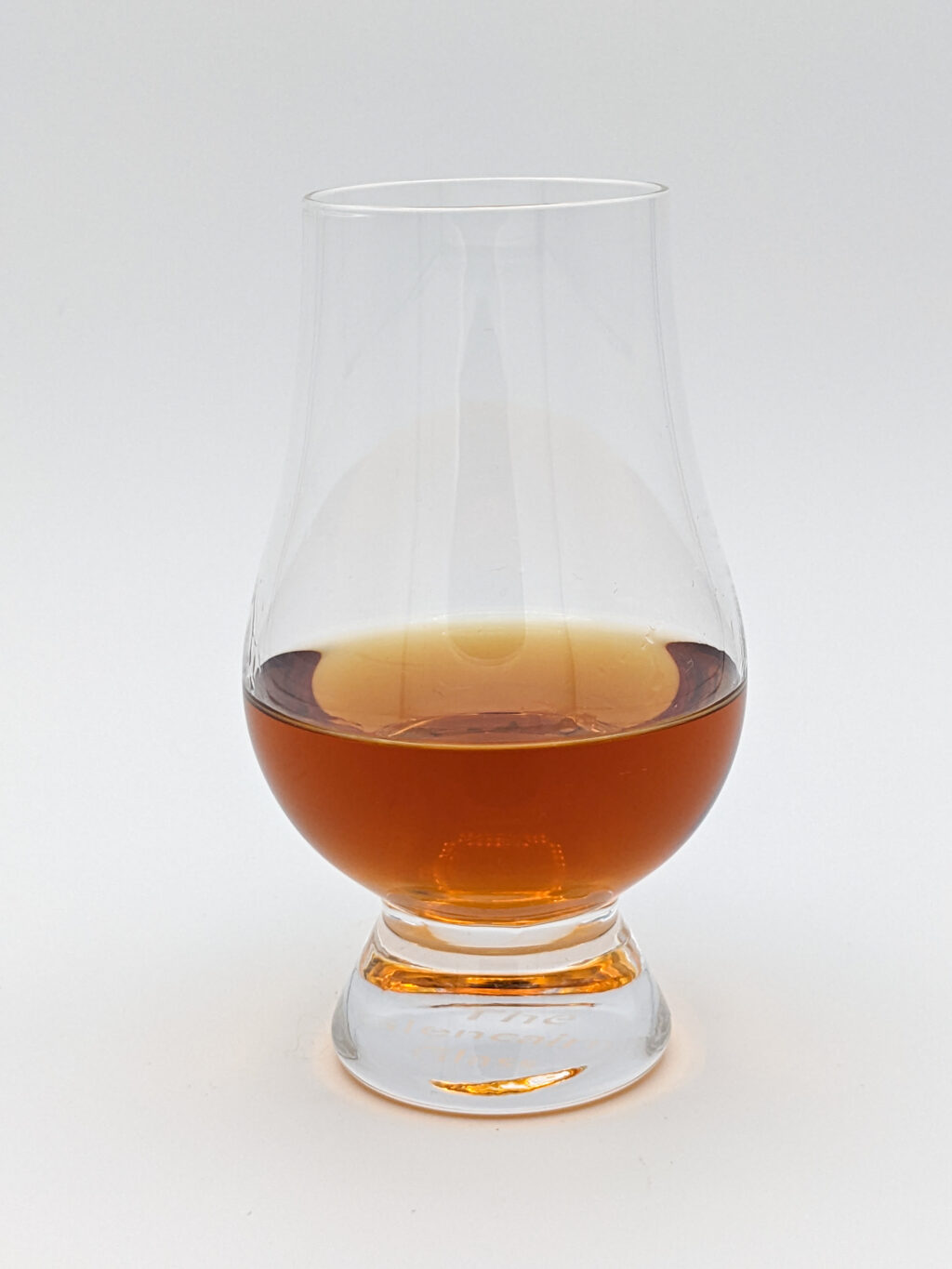 brown liquid in a glencairn glass