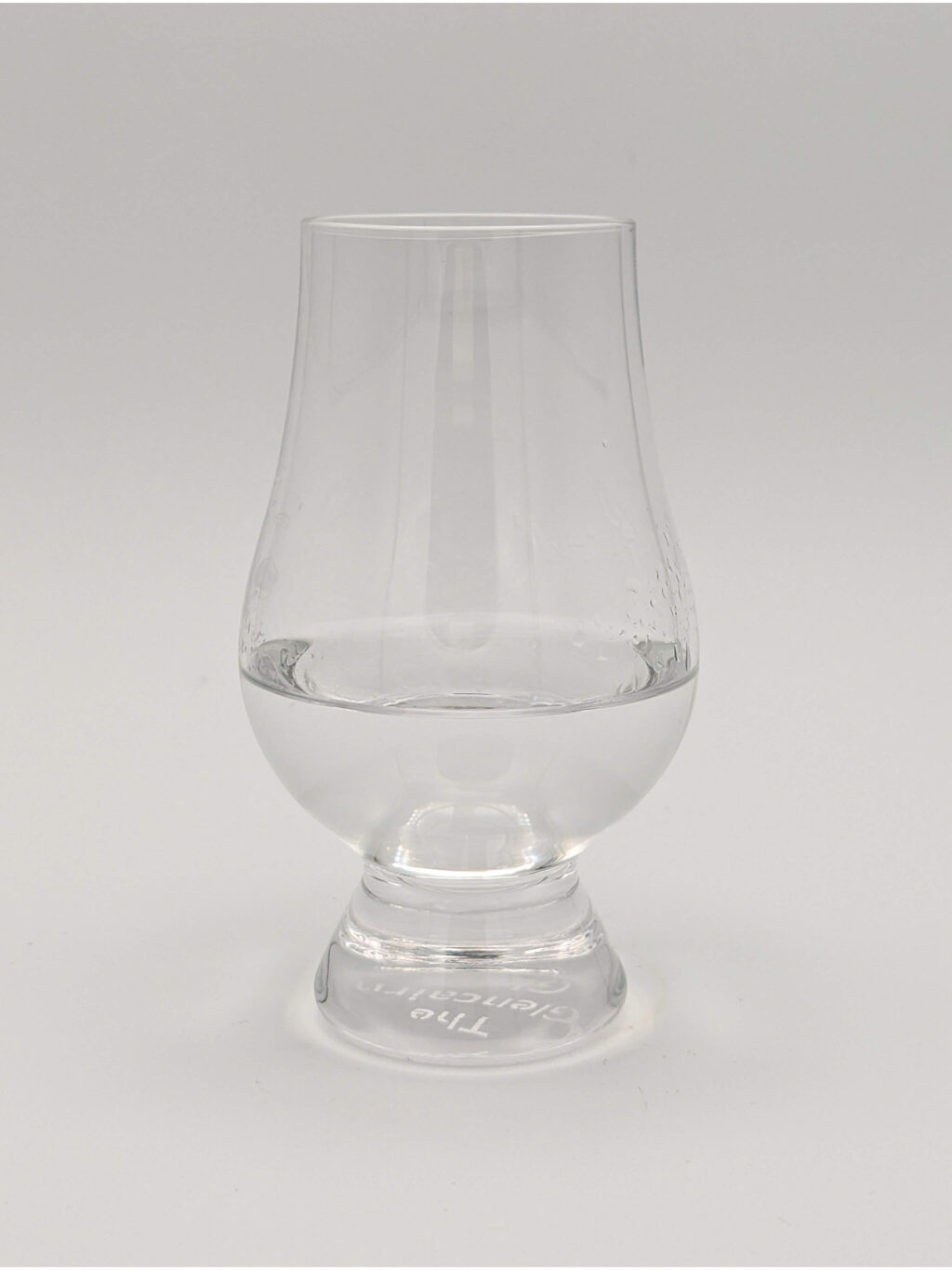 Clear liquid in a glencairn glass