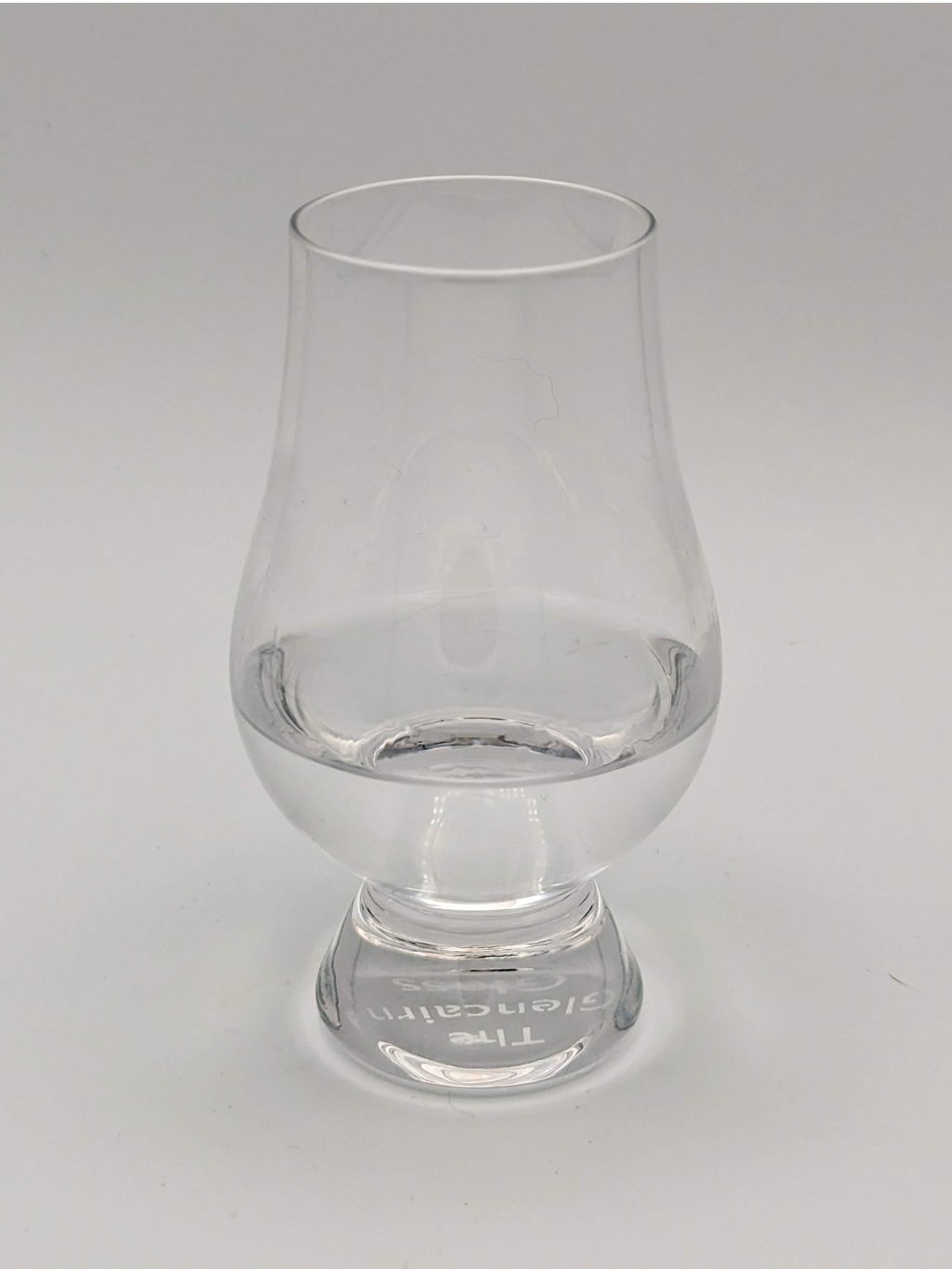 Clear liquid in a glencairn glass