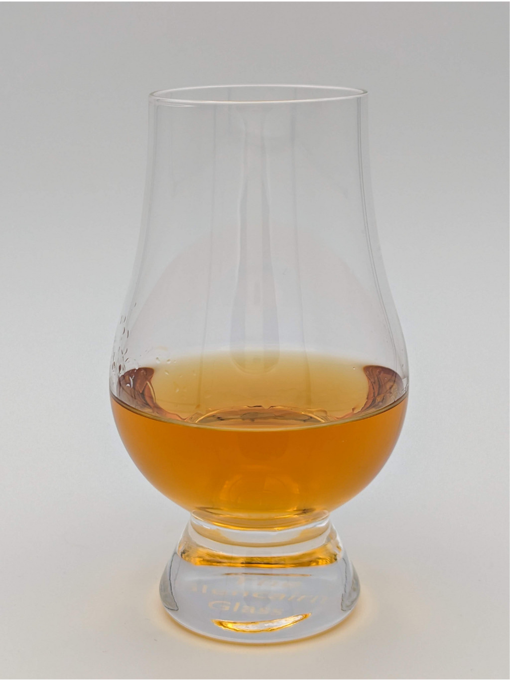 light brown liquid in a glencairn glass