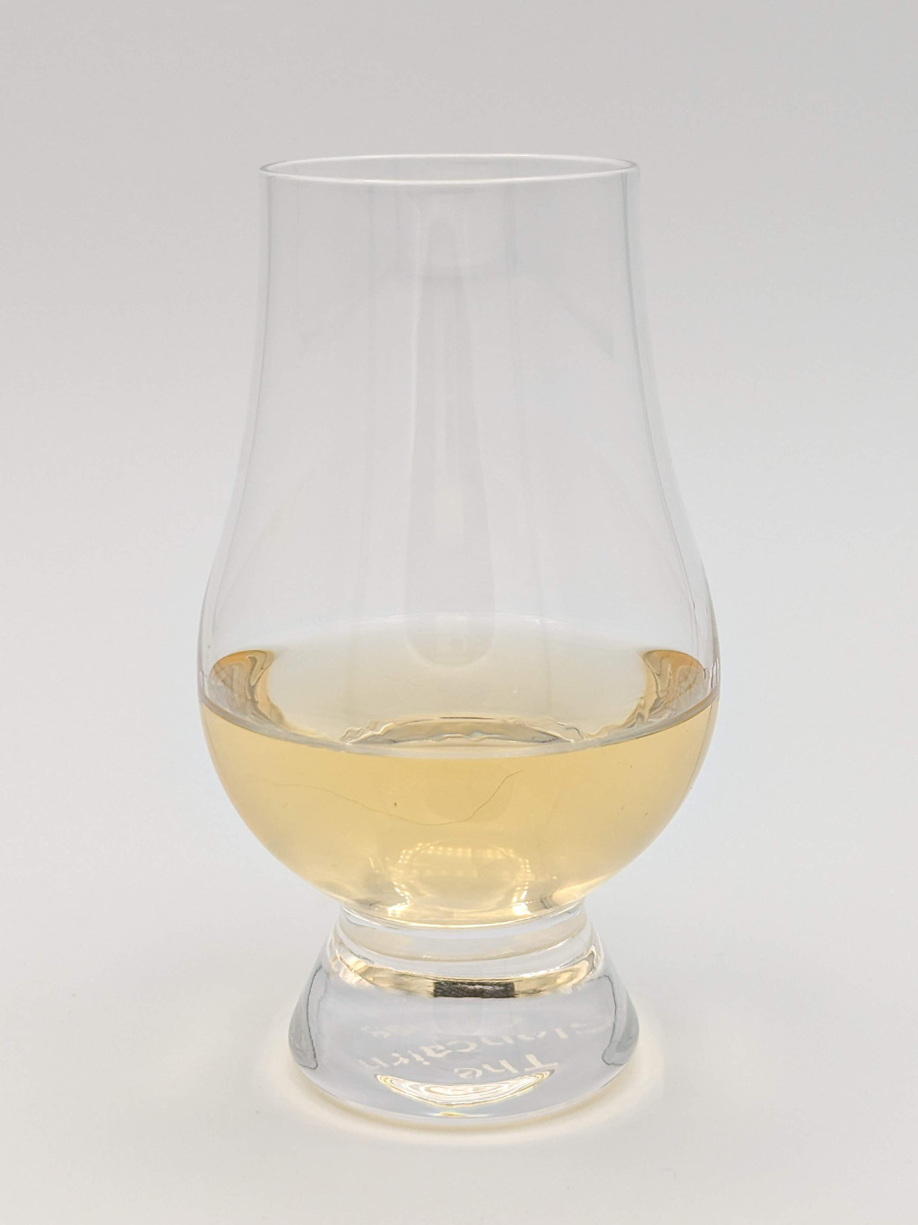 Straw colored liquid in a glencarin glass
