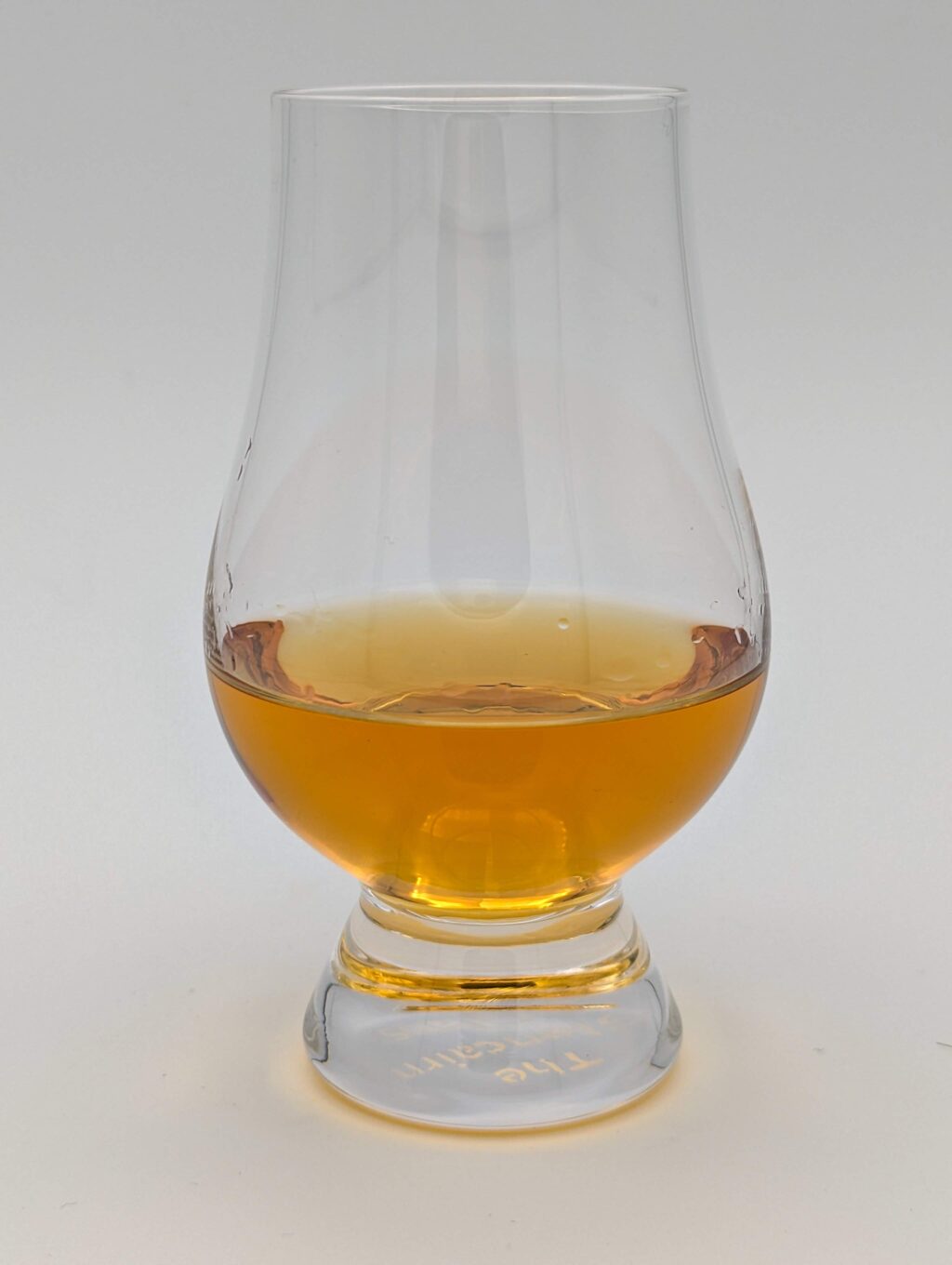 Gold Liquid in a glencairn glass