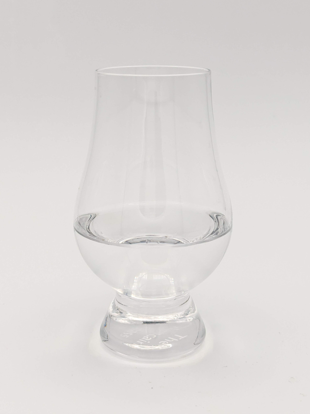 clear liquid in a glencairn glass