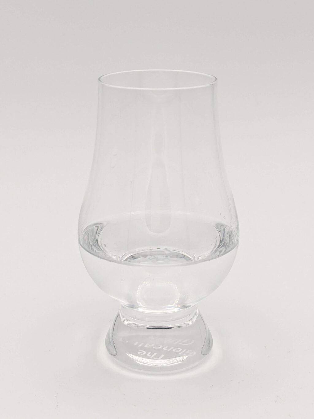 Clear liquid in a glencairn glass