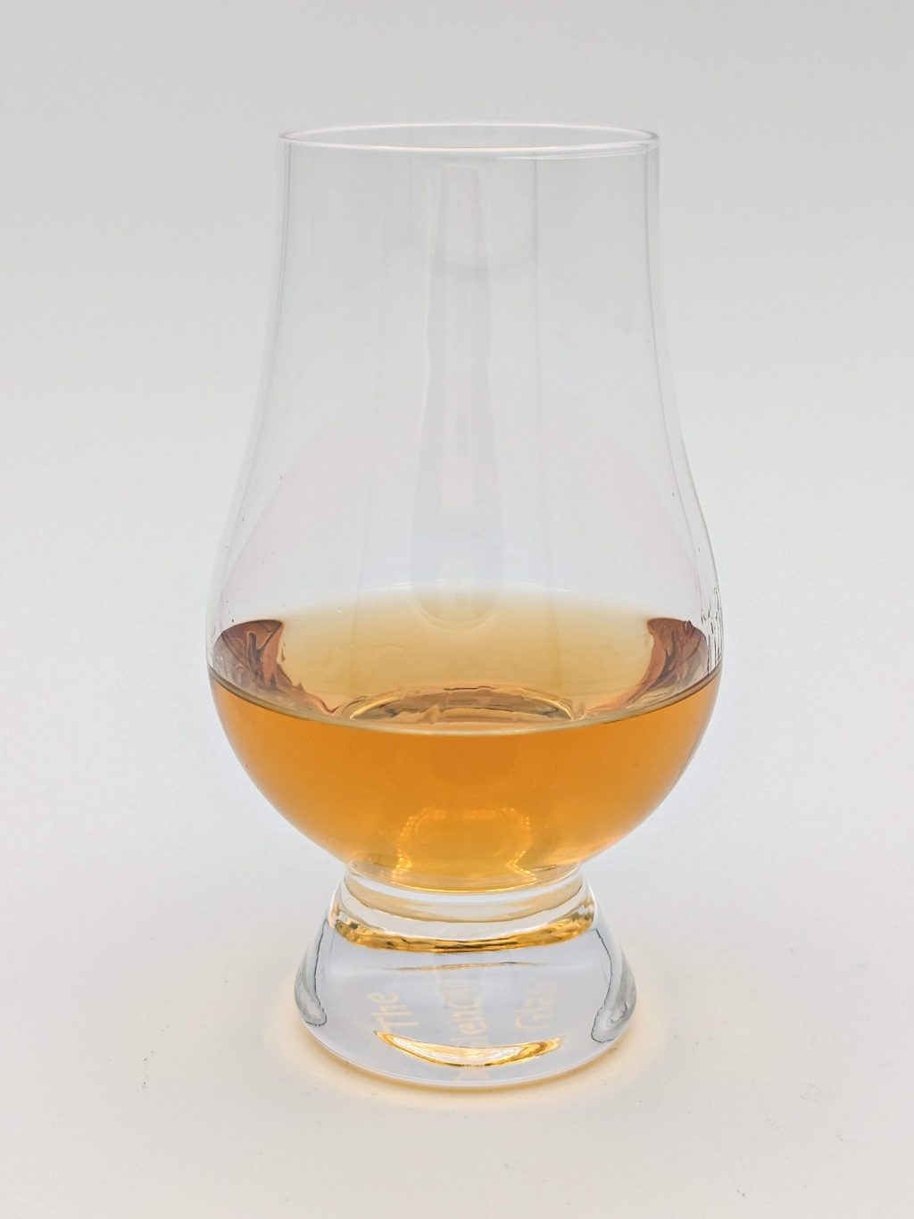 Gold Liquid in a Glencairn glass