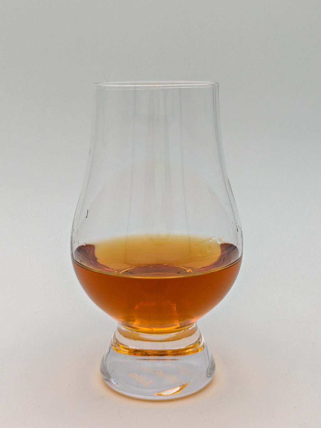 Amber liquid in a glencairn glass